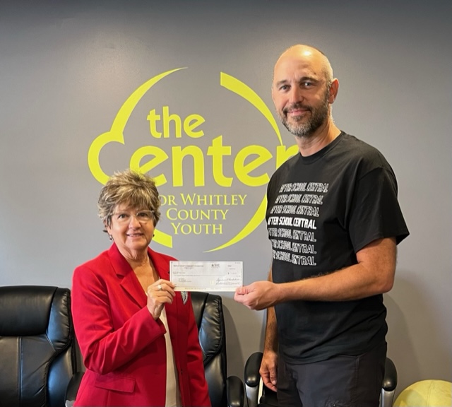 Donation of $1,000 to “The Center”
